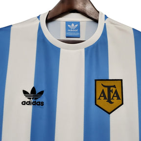 camisa-retro-argentina-1978-masculina-adidas-branca-com-detalhes-em-azul
