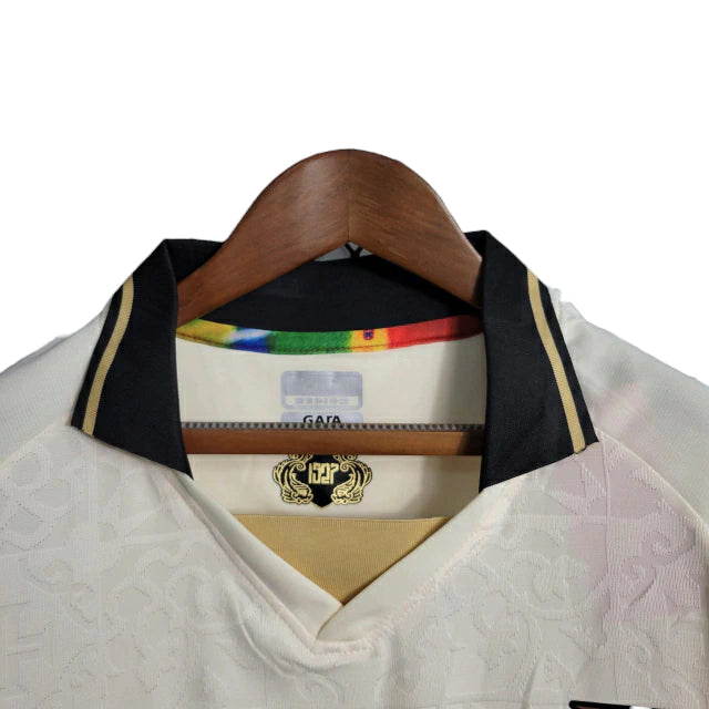 camisa-vasco-da-gama-iii-22-23-torcedor-kappa-feminina-branca-com-detalhes-em-preto-e-dourado